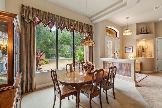 23 Creekside Dr, Palm Coast, FL 32137 - dining room with baseboards and light tile patterned flooring