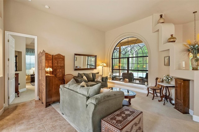 23 Creekside Dr, Palm Coast, FL 32137 - living room featuring light colored carpet and baseboards