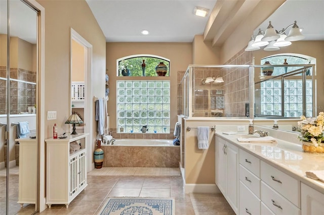 23 Creekside Dr, Palm Coast, FL 32137 - full bath featuring a garden tub, vanity, a shower stall, tile patterned floors, and recessed lighting