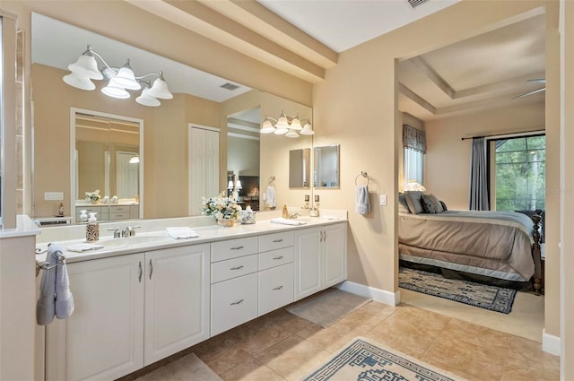 23 Creekside Dr, Palm Coast, FL 32137 - ensuite bathroom featuring double vanity, a chandelier, and tile patterned floors
