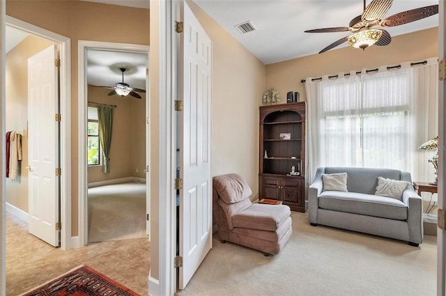 23 Creekside Dr, Palm Coast, FL 32137 - sitting room with ceiling fan and light colored carpet