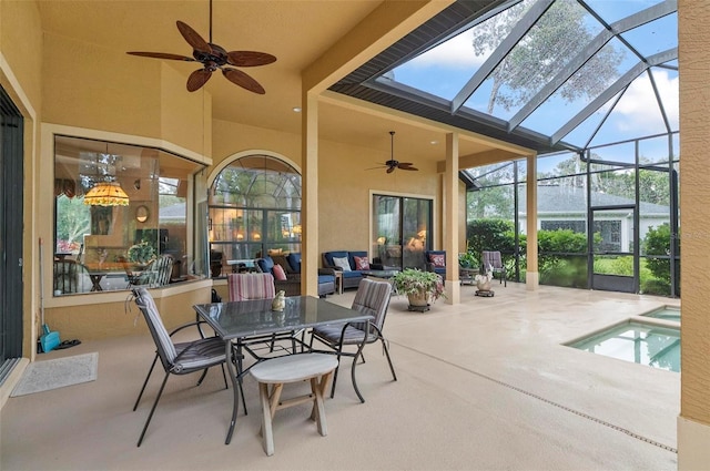 23 Creekside Dr, Palm Coast, FL 32137 - view of patio / terrace featuring a ceiling fan, glass enclosure, an outdoor hangout area, and a pool with connected hot tub