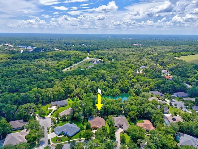 23 Creekside Dr, Palm Coast, FL 32137 - aerial perspective of suburban area with a heavily wooded area