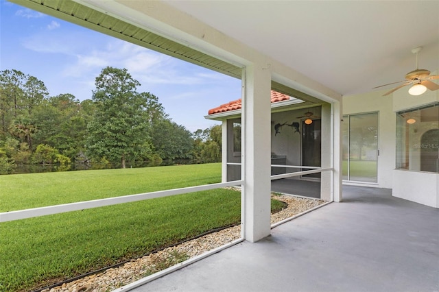 16 Birchwood Pl, Palm Coast, FL 32137 - unfurnished sunroom with a ceiling fan