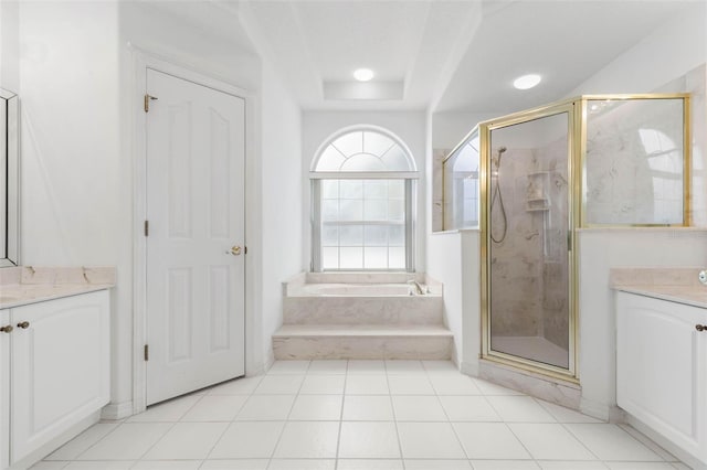 16 Birchwood Pl, Palm Coast, FL 32137 - full bath featuring vanity, a garden tub, a marble finish shower, and tile patterned floors