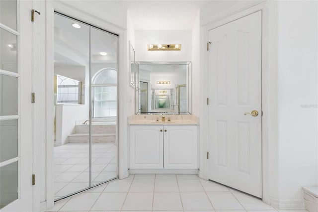 16 Birchwood Pl, Palm Coast, FL 32137 - bathroom with vanity and tile patterned floors