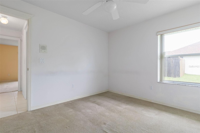 16 Birchwood Pl, Palm Coast, FL 32137 - spare room featuring light carpet and ceiling fan