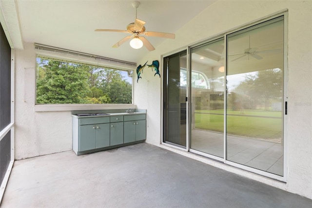 16 Birchwood Pl, Palm Coast, FL 32137 - unfurnished sunroom featuring ceiling fan, healthy amount of natural light, and lofted ceiling