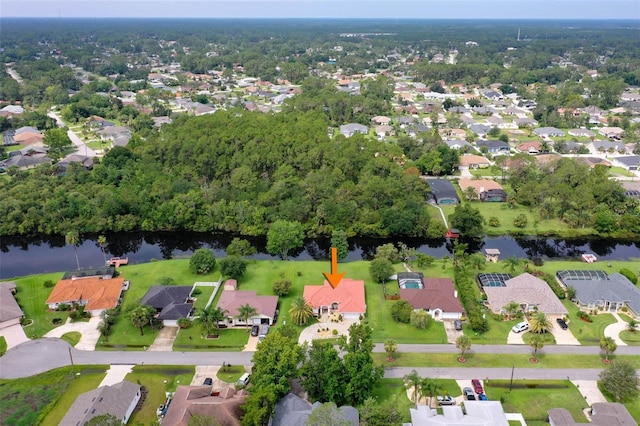 16 Birchwood Pl, Palm Coast, FL 32137 - aerial view of property's location with a large body of water and nearby suburban area