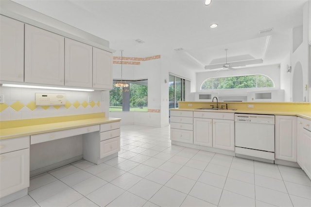 16 Birchwood Pl, Palm Coast, FL 32137 - kitchen featuring decorative backsplash, dishwasher, plenty of natural light, light countertops, and recessed lighting