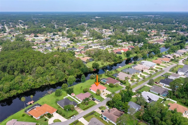 16 Birchwood Pl, Palm Coast, FL 32137 - aerial overview of property's location with a large body of water and nearby suburban area
