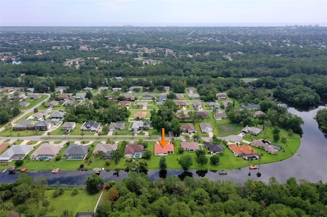 16 Birchwood Pl, Palm Coast, FL 32137 - aerial overview of property's location featuring a large body of water and nearby suburban area