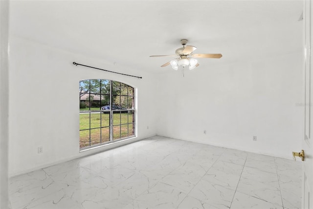 2790 Pelham Cir, Deltona, FL 32738 - unfurnished room with marble finish flooring and ceiling fan