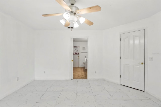 2790 Pelham Cir, Deltona, FL 32738 - spare room with light marble finish flooring and ceiling fan