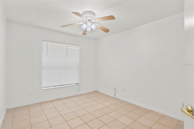 2790 Pelham Cir, Deltona, FL 32738 - empty room with ceiling fan and light tile patterned flooring