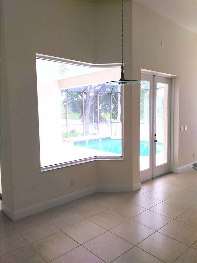 28 Front St, Palm Coast, FL 32137 - unfurnished room with light tile patterned flooring and french doors