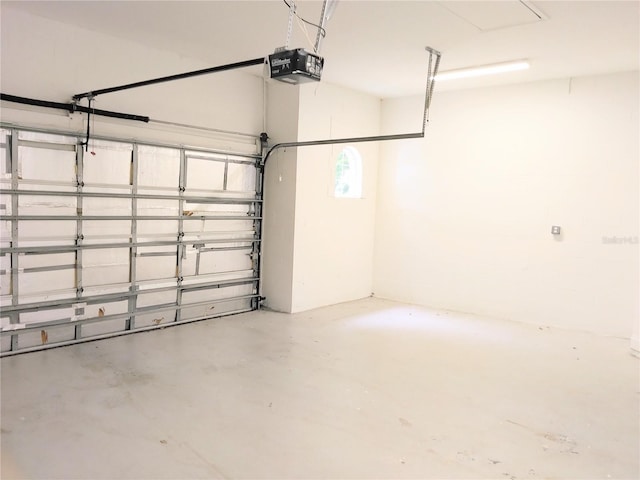 28 Front St, Palm Coast, FL 32137 - garage featuring a garage door opener