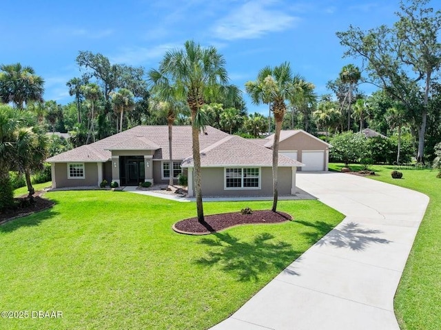 3959 S Chinook Ln, Ormond Beach, FL 32174 - single story home featuring driveway, a front yard, and stucco siding