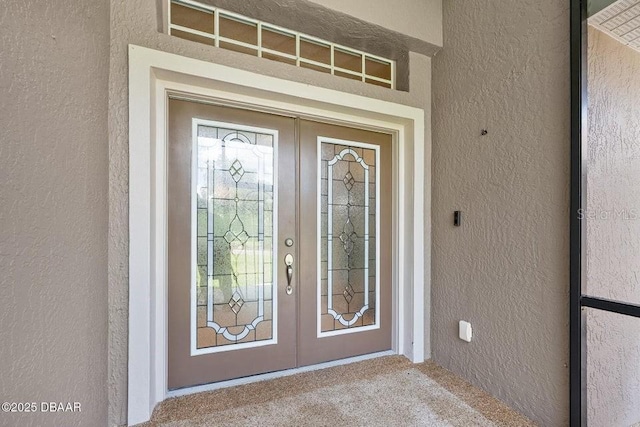 3959 S Chinook Ln, Ormond Beach, FL 32174 - entrance to property with stucco siding and french doors