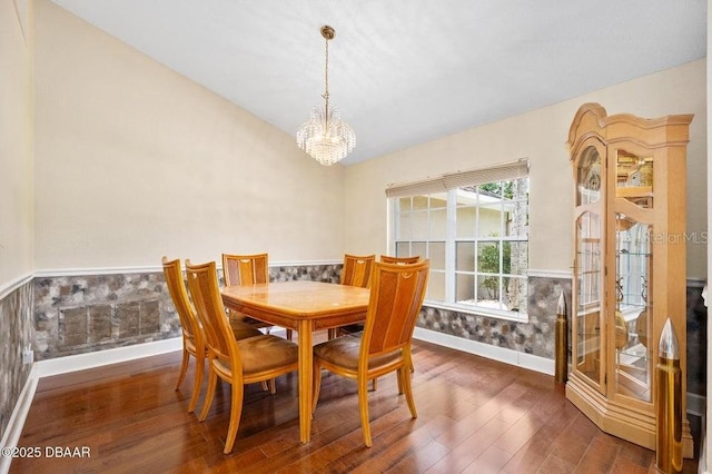 3959 S Chinook Ln, Ormond Beach, FL 32174 - dining room with wood finished floors and a chandelier