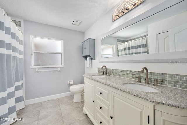 3959 S Chinook Ln, Ormond Beach, FL 32174 - bathroom featuring double vanity, tile patterned flooring, and curtained shower