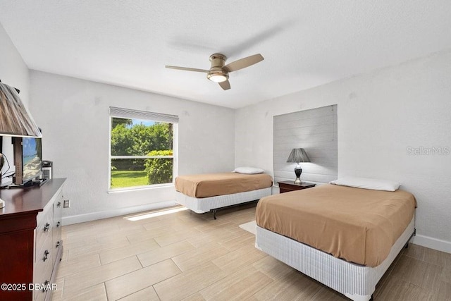 3959 S Chinook Ln, Ormond Beach, FL 32174 - bedroom featuring baseboards and a ceiling fan