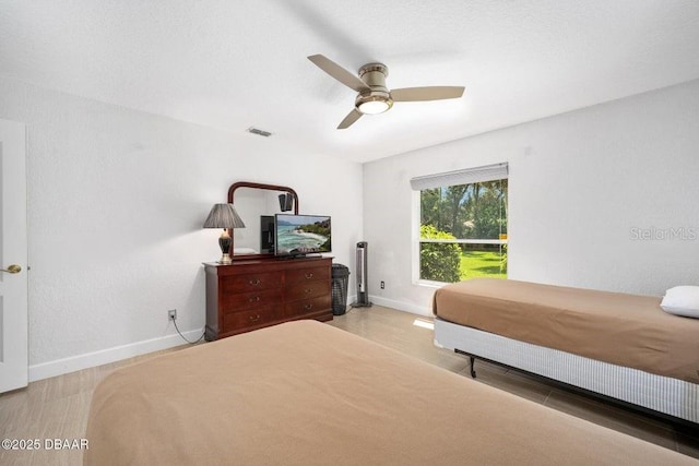 3959 S Chinook Ln, Ormond Beach, FL 32174 - bedroom featuring a ceiling fan and light wood-style floors