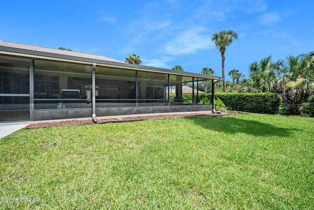 3959 S Chinook Ln, Ormond Beach, FL 32174 - view of grassy yard featuring a sunroom