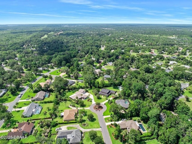 3959 S Chinook Ln, Ormond Beach, FL 32174 - aerial view of property's location featuring a heavily wooded area and nearby suburban area