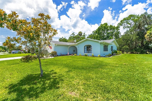 16 Courtney Pl, Palm Coast, FL 32137 - single story home with a front lawn and stucco siding