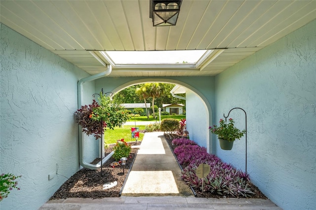 16 Courtney Pl, Palm Coast, FL 32137 - doorway to property with stucco siding