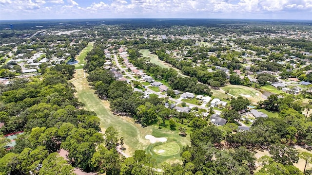 16 Courtney Pl, Palm Coast, FL 32137 - aerial view of property and surrounding area featuring a golf club and nearby suburban area