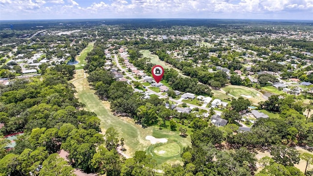 16 Courtney Pl, Palm Coast, FL 32137 - aerial view of property and surrounding area featuring a golf course and nearby suburban area