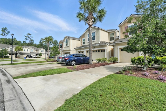 176 Nelson Ln, Saint Johns, FL 32259 - view of front of house with a residential view, driveway, an attached garage, stucco siding, and a front lawn