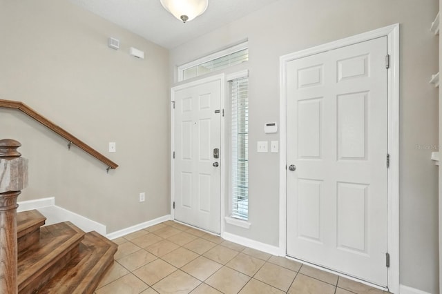 176 Nelson Ln, Saint Johns, FL 32259 - foyer with stairway, healthy amount of natural light, and light tile patterned flooring