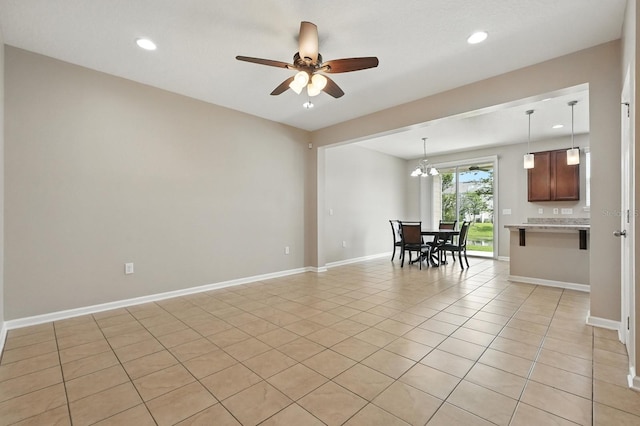 176 Nelson Ln, Saint Johns, FL 32259 - spare room featuring ceiling fan, recessed lighting, light tile patterned floors, and a chandelier