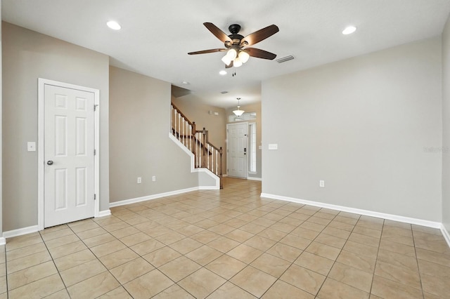 176 Nelson Ln, Saint Johns, FL 32259 - empty room with ceiling fan, stairs, light tile patterned flooring, and recessed lighting
