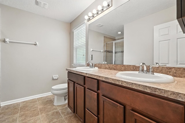 176 Nelson Ln, Saint Johns, FL 32259 - full bath with a stall shower, double vanity, tile patterned flooring, and a textured ceiling