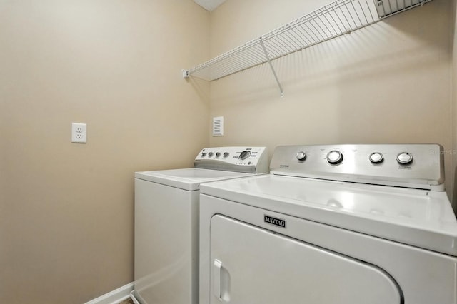 176 Nelson Ln, Saint Johns, FL 32259 - laundry area with independent washer and dryer and baseboards