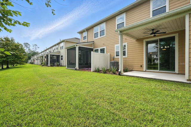 176 Nelson Ln, Saint Johns, FL 32259 - rear view of house featuring a ceiling fan, a sunroom, a yard, and a patio