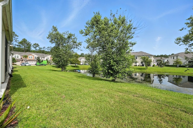 176 Nelson Ln, Saint Johns, FL 32259 - view of grassy yard featuring a residential view and a water view
