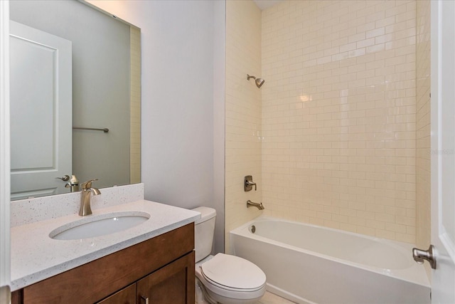 bathroom with vanity, shower / tub combination, and toilet