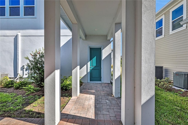 property entrance with central AC unit