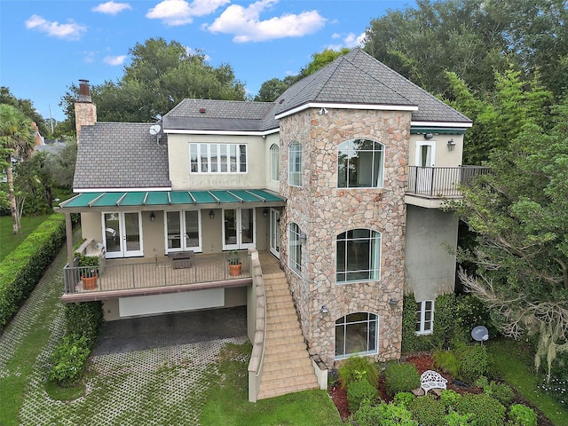 view of front of home with a balcony