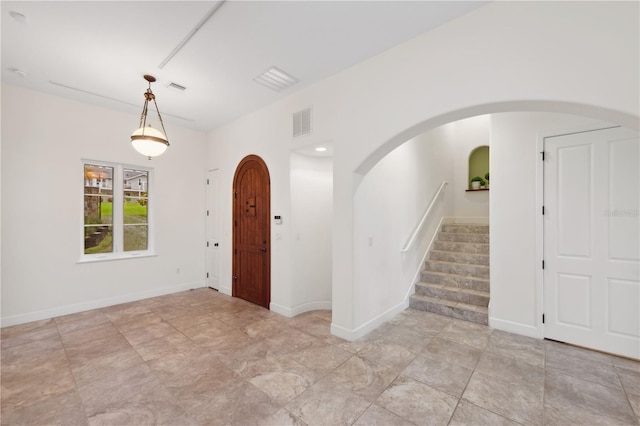 entrance foyer with light tile floors