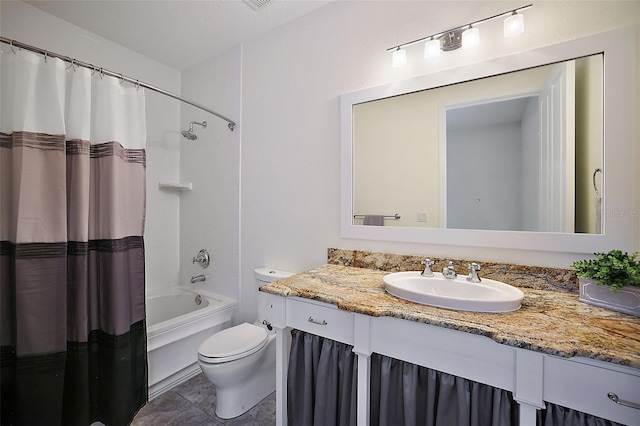 full bathroom with shower / tub combo, tile floors, large vanity, and toilet