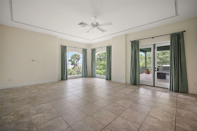 unfurnished room with french doors, ceiling fan, and light tile floors