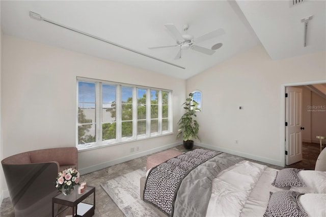 bedroom with light tile flooring, vaulted ceiling, and ceiling fan