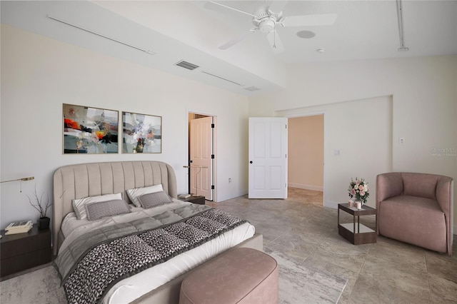 tiled bedroom featuring lofted ceiling and ceiling fan