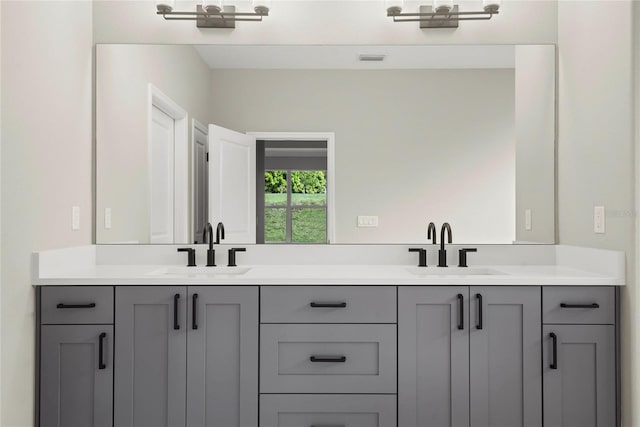 bathroom with double vanity